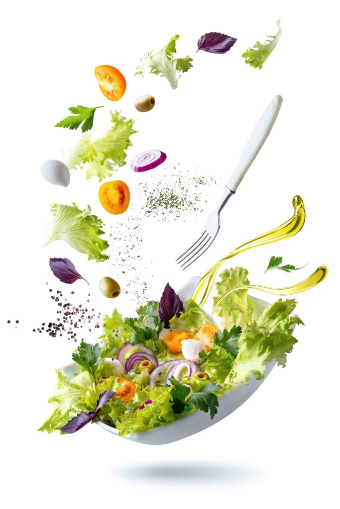white plate with salad floating air ingredients olives lettuce onion tomato mozzarella cheese parsley basil olive oil 1